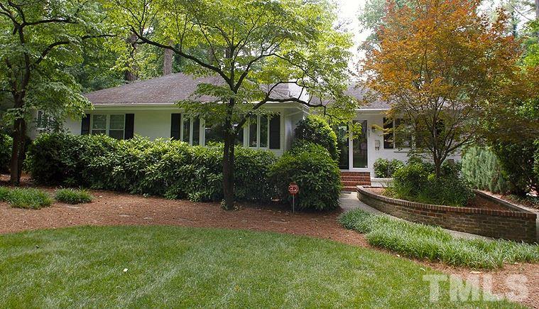 1307 Duplin Road Raleigh, NC 27607 - Photo 1 of 19 a front view of a house with a yard