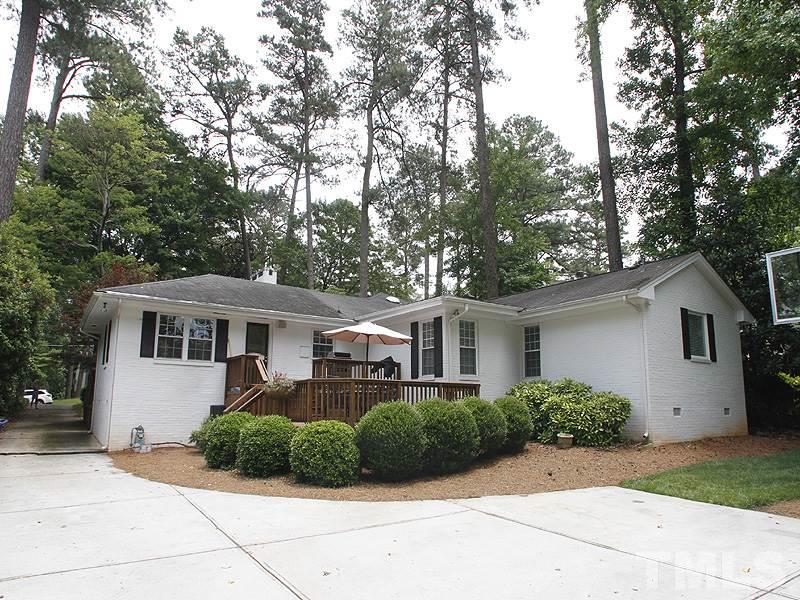 1307 Duplin Road Raleigh, NC 27607 - Photo 19 of 19 a front view of a house with a yard