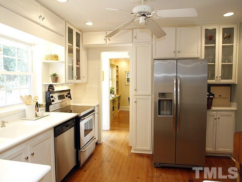 1307 Duplin Road Raleigh, NC 27607 - Photo 4 of 19 a kitchen with stainless steel appliances granite countertop a refrigerator a sink and dishwasher