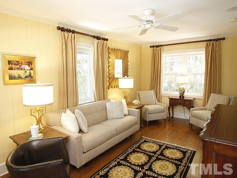 1307 Duplin Road Raleigh, NC 27607 - Photo 7 of 19 a living room with furniture and a large window