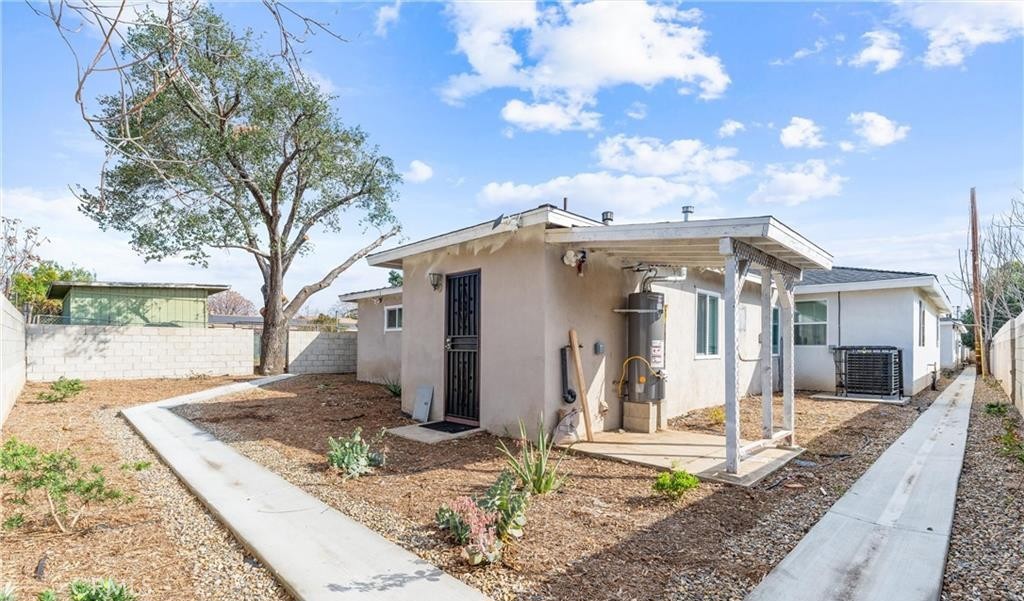 1531 West Orange Grove Avenue Pomona, CA 91768 - Photo 16 of 16 a view of a house with a yard