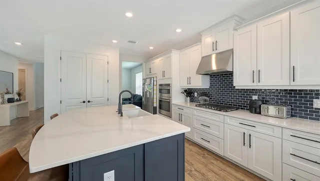 a view of entryway with wooden floor