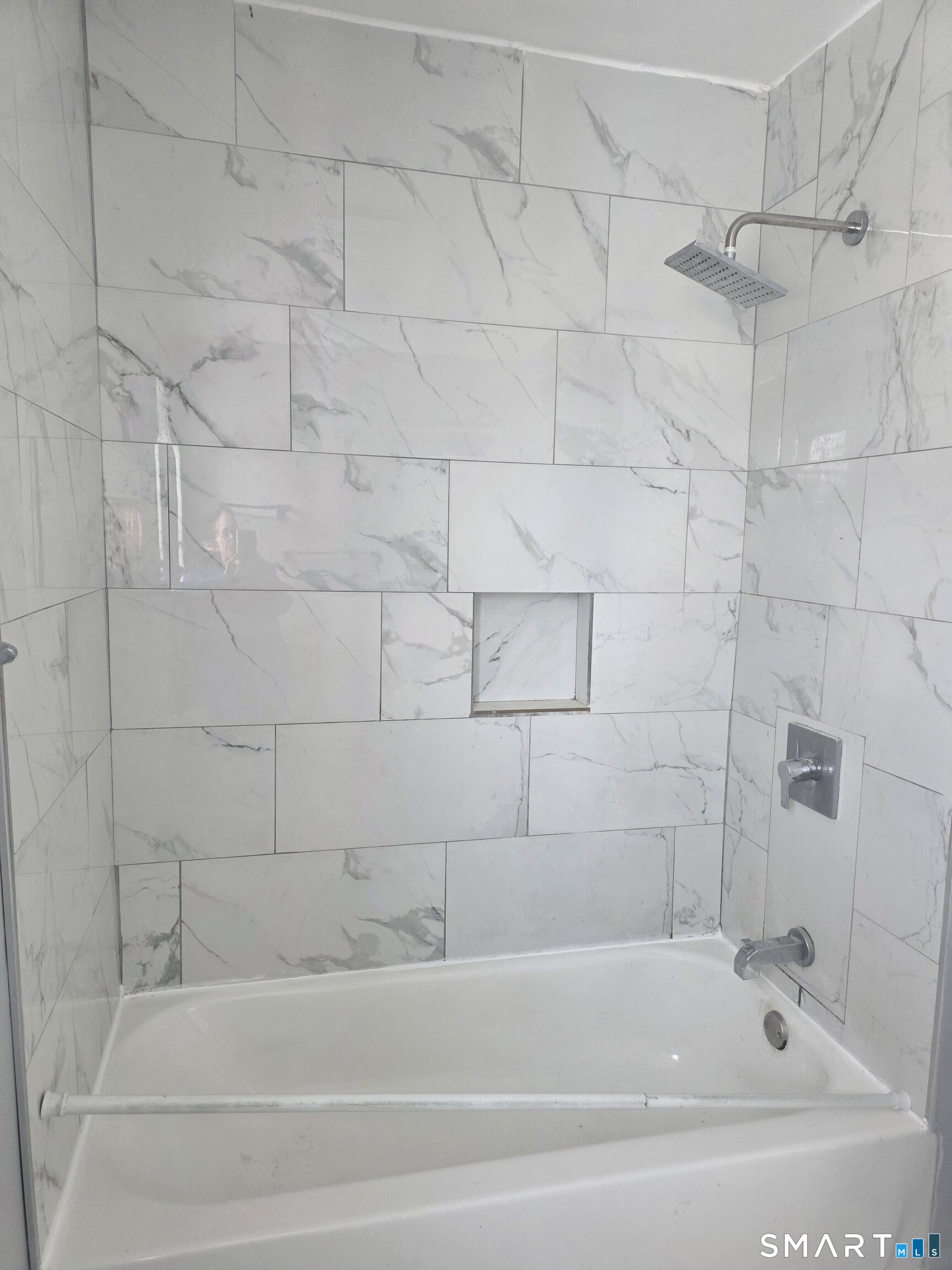 46 Ward Street Waterbury, CT 06704 - Photo 6 of 9 a bathroom with a bathtub