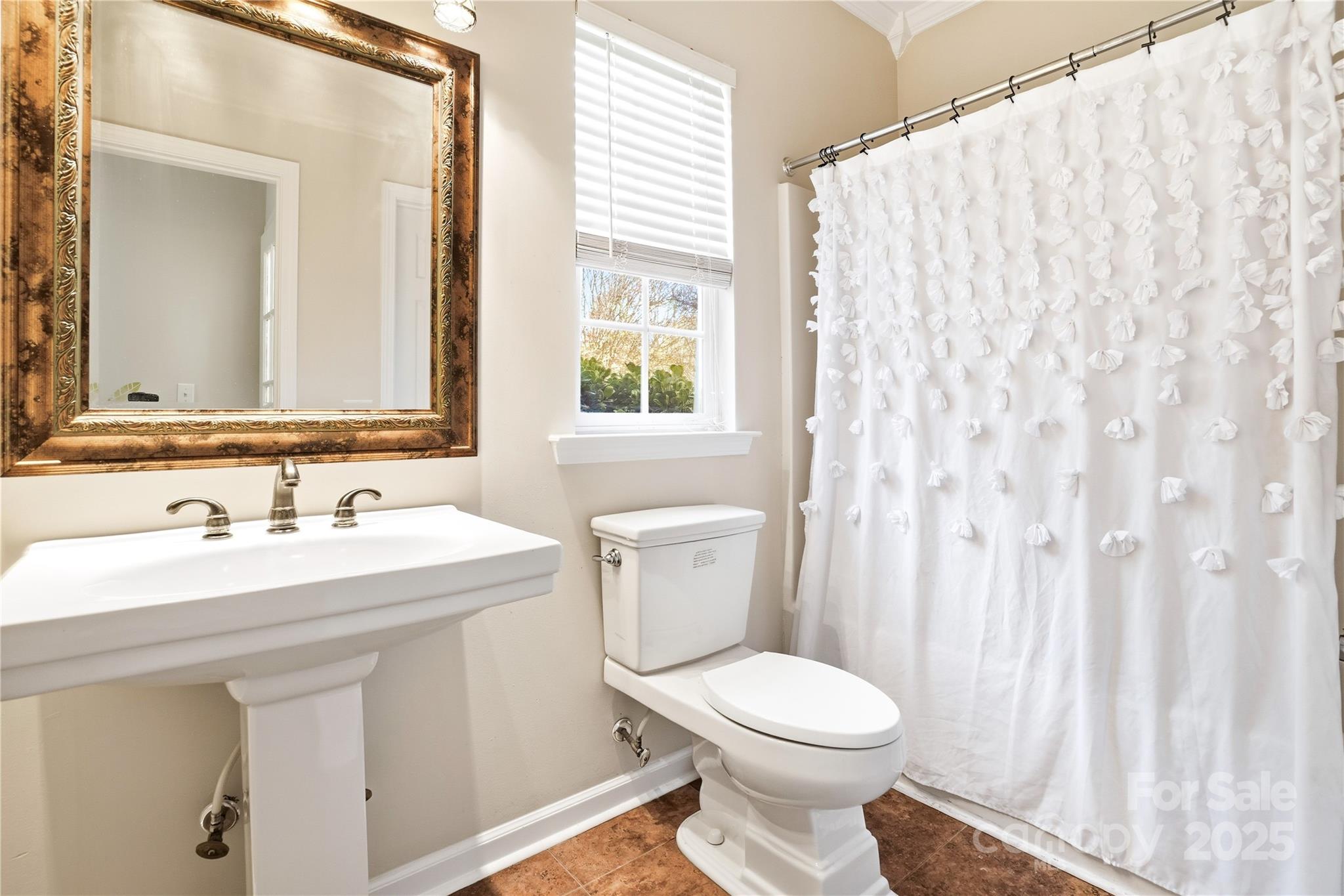 18015 Harbor Mist Road Cornelius, NC 28031 - Photo 25 of 37 a bathroom with a toilet sink and mirror
