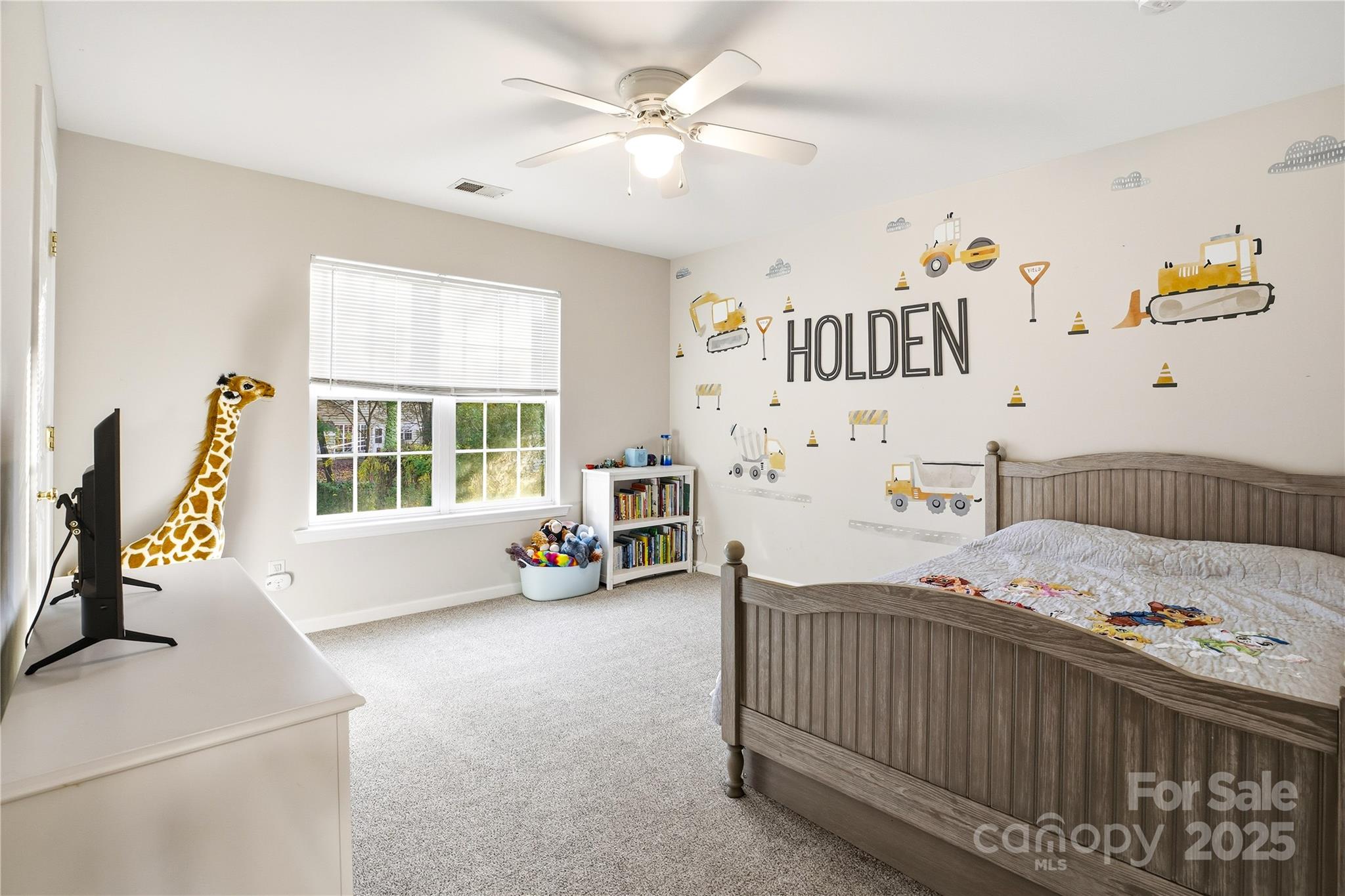 18015 Harbor Mist Road Cornelius, NC 28031 - Photo 26 of 37 a bedroom with a bed and a window