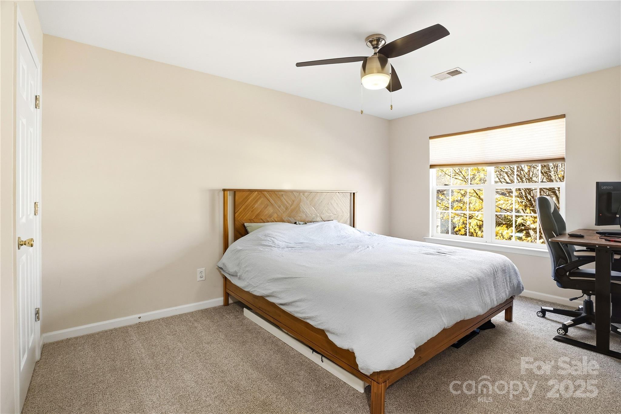 18015 Harbor Mist Road Cornelius, NC 28031 - Photo 28 of 37 a bed sitting in a bedroom next to a window