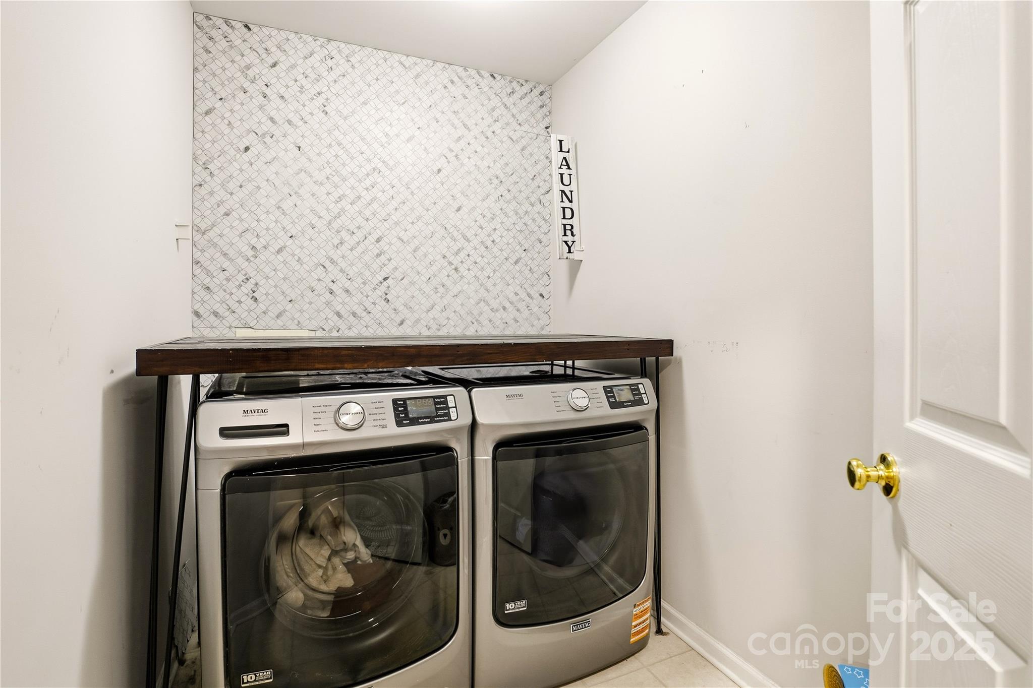 18015 Harbor Mist Road Cornelius, NC 28031 - Photo 30 of 37 a close up view of a washer and dryer