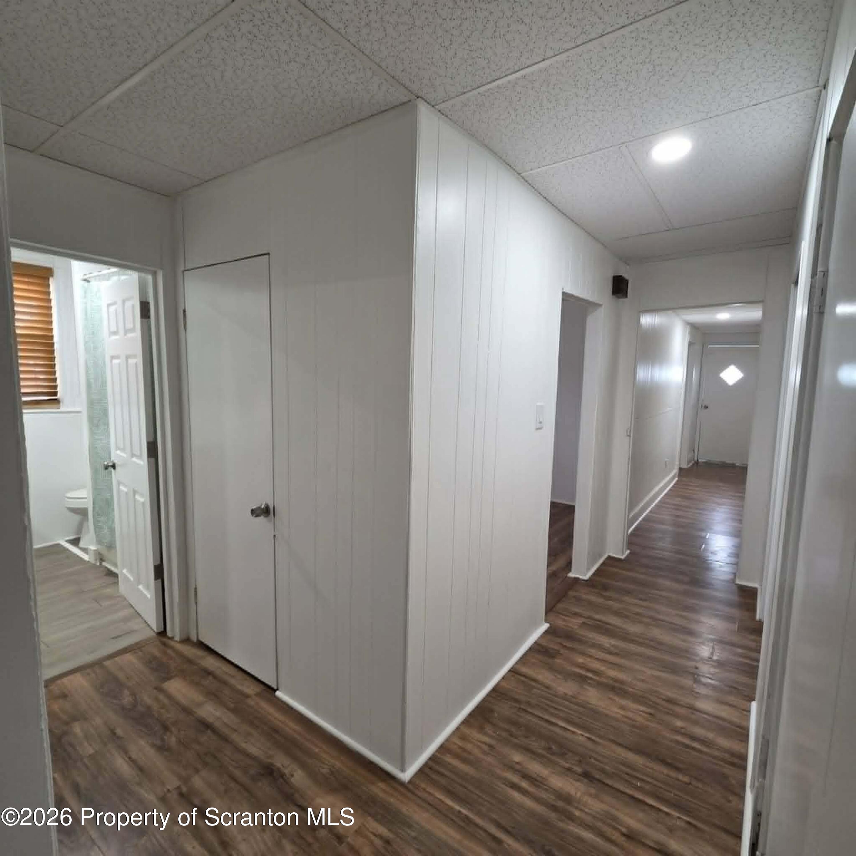 1606 Dickson Avenue, Unit 1 Scranton, PA 18509 - Photo 10 of 16 a view of a hallway with wooden floor