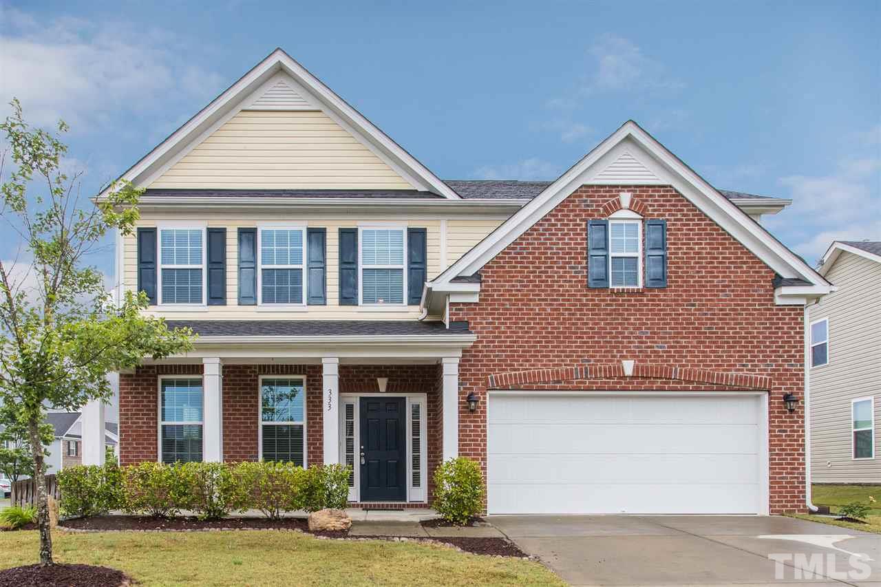 333 Hope Valley Road Knightdale, NC 27545 - Photo 1 of 22 a front view of a house with garden