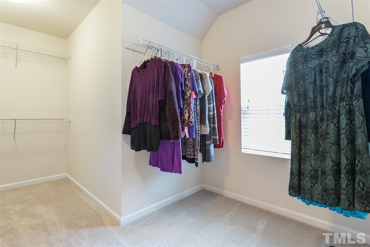 333 Hope Valley Road Knightdale, NC 27545 - Photo 14 of 22 a view of walk in closet with clothes
