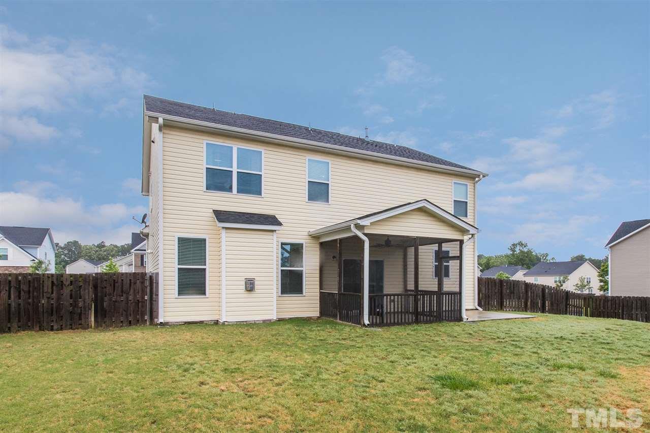 333 Hope Valley Road Knightdale, NC 27545 - Photo 20 of 22 a view of a house with a yard and fence