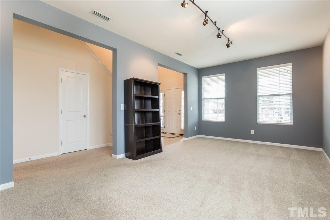 333 Hope Valley Road Knightdale, NC 27545 - Photo 3 of 22 an empty room with windows and closet