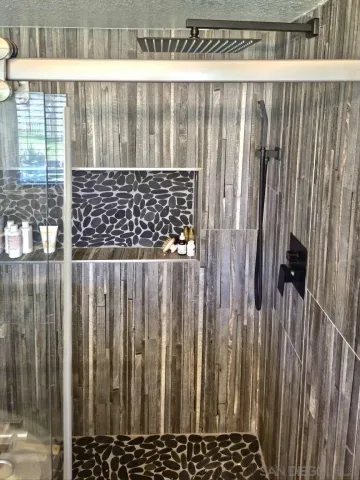 a bed room with a bed and a couch