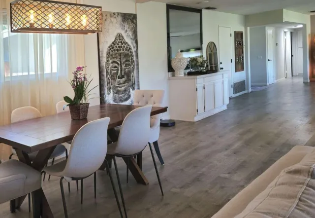 a view of a dining room with furniture