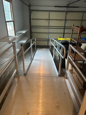 a view of an empty room with stairs