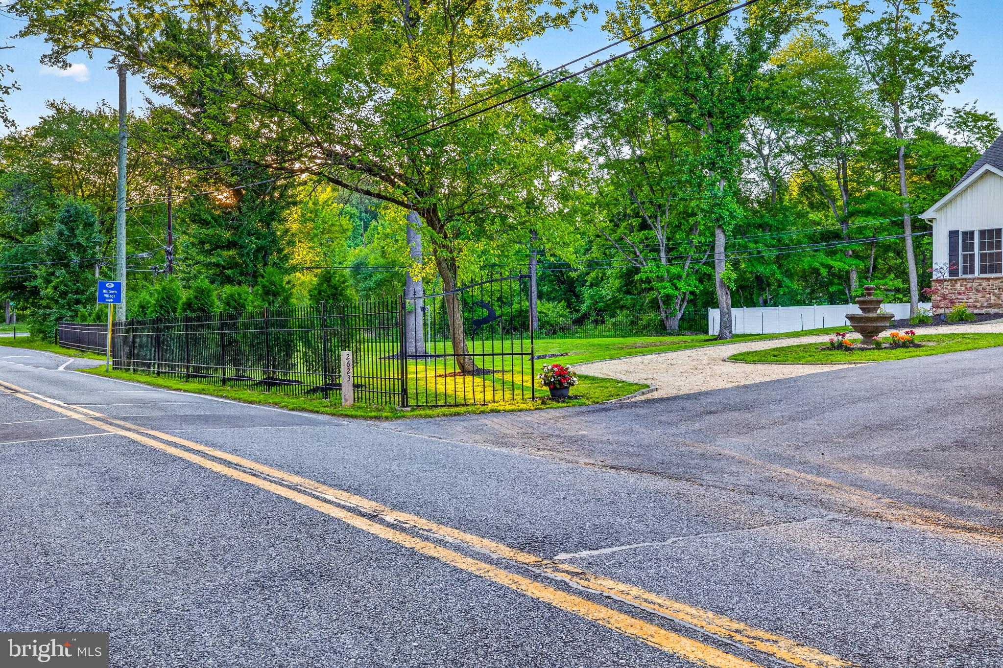 2623 Pike Creek Road Wilmington, DE 19808 - Photo 50 of 66 Charming intersection with lush greenery.
