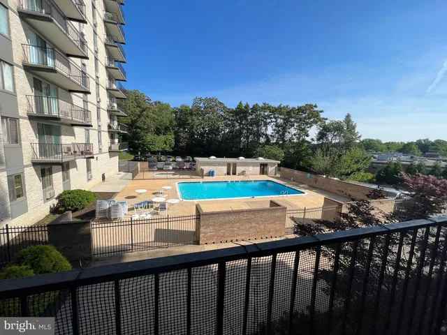 a view of balcony with furniture