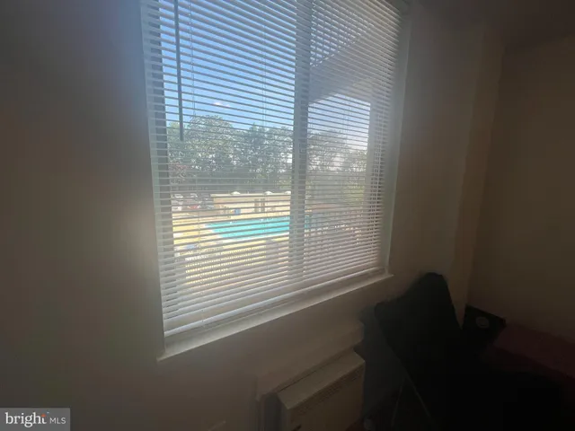 a view of balcony with furniture