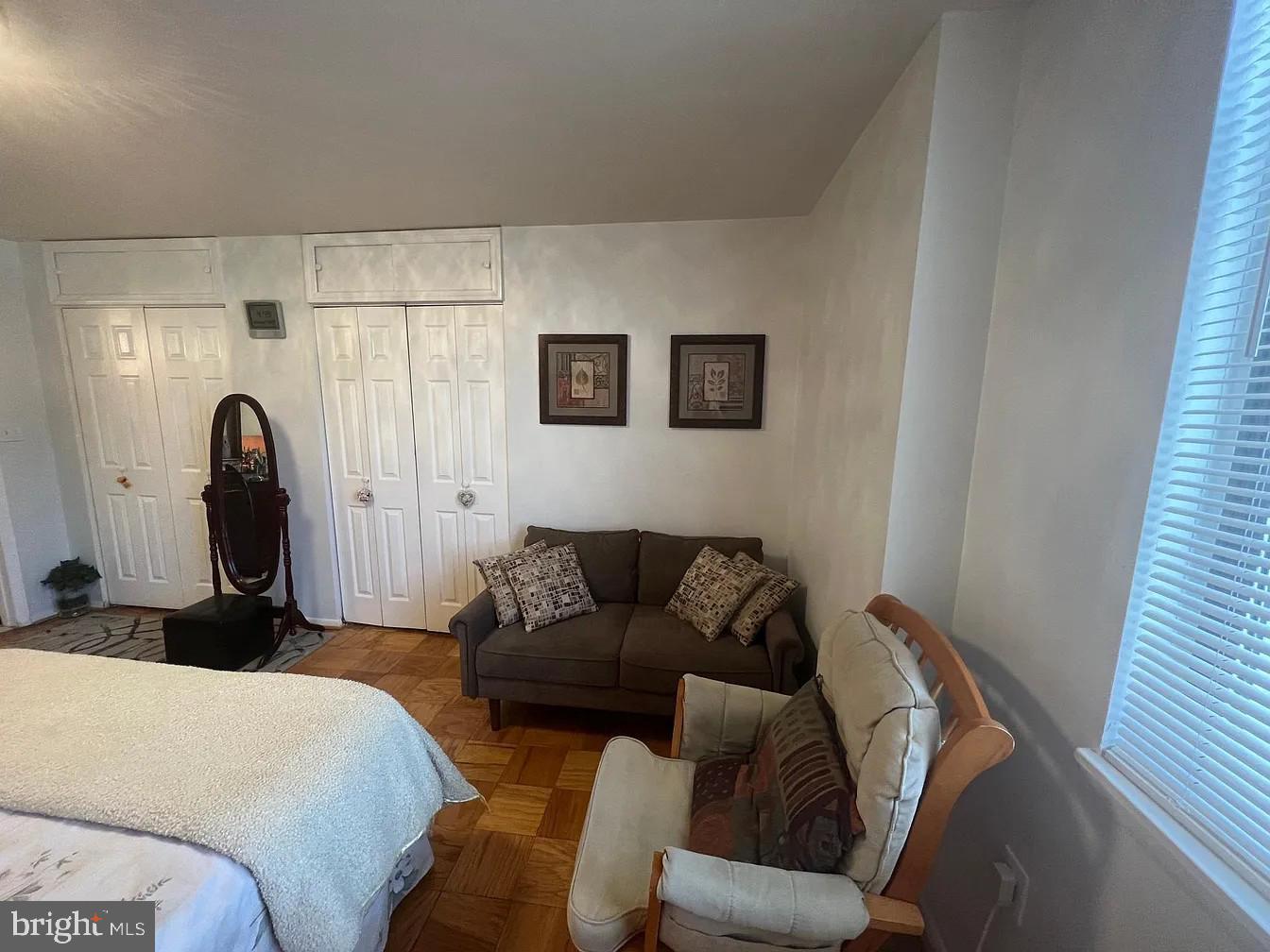 3245 Rio Drive, Unit 204 Falls Church, VA 22041 - Photo 32 of 34 a living room with furniture and a window