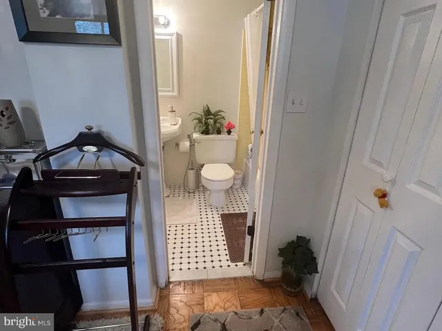 a room with furniture and wooden floor