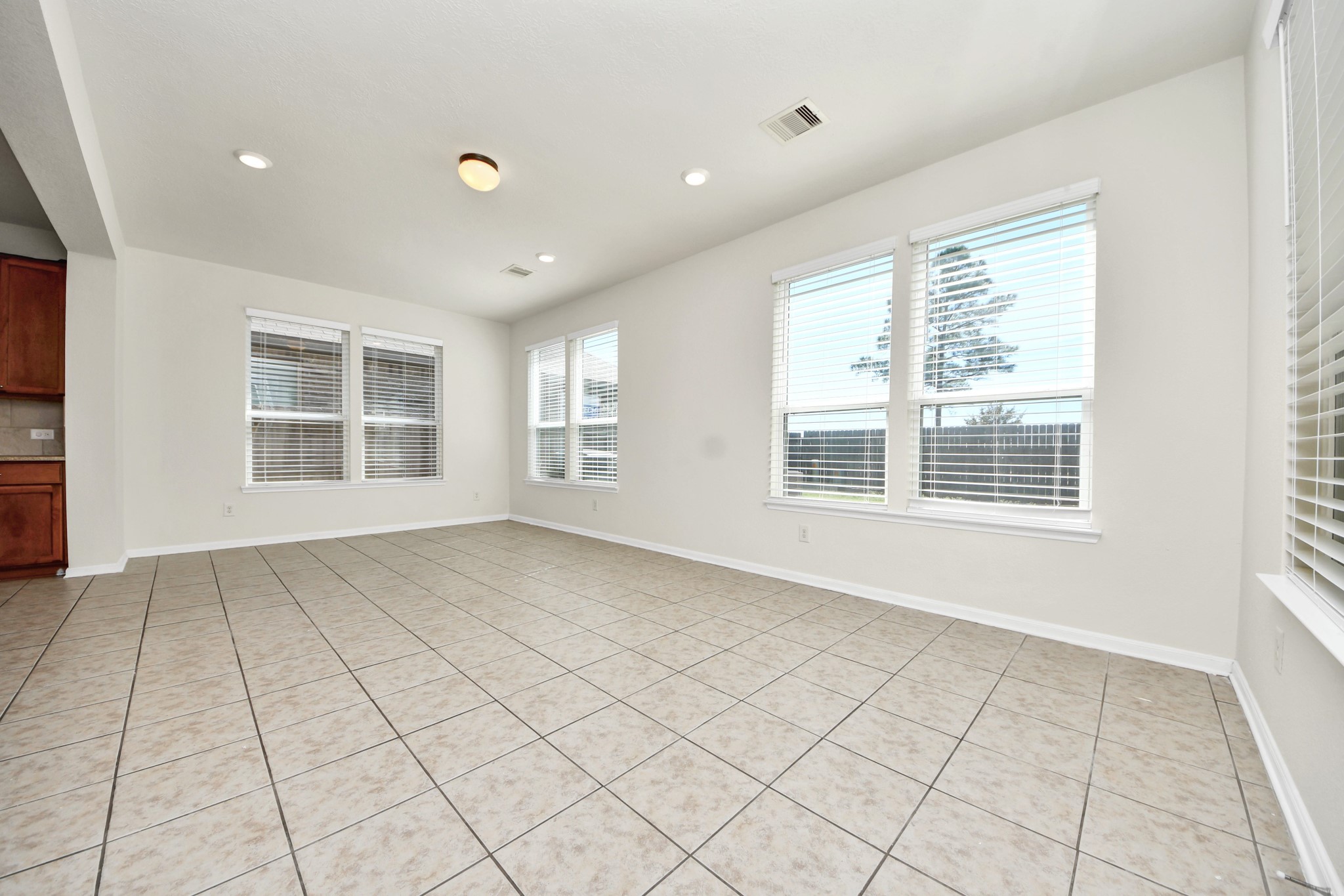 24123 Adobe Ridge Lane Katy, TX 77493 - Photo 17 of 45 a view of an empty room with a window