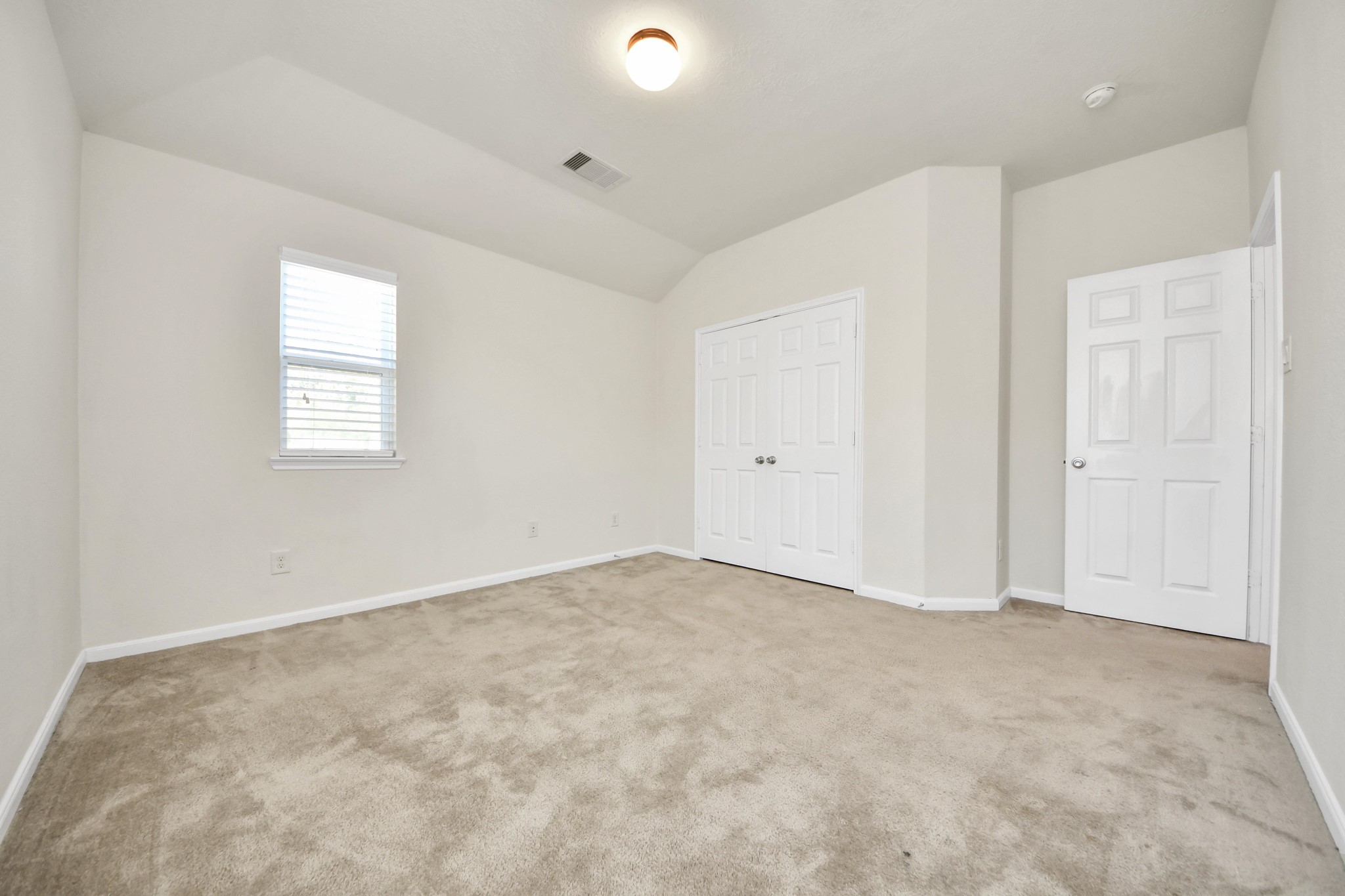 24123 Adobe Ridge Lane Katy, TX 77493 - Photo 26 of 45 an empty room with windows and closet