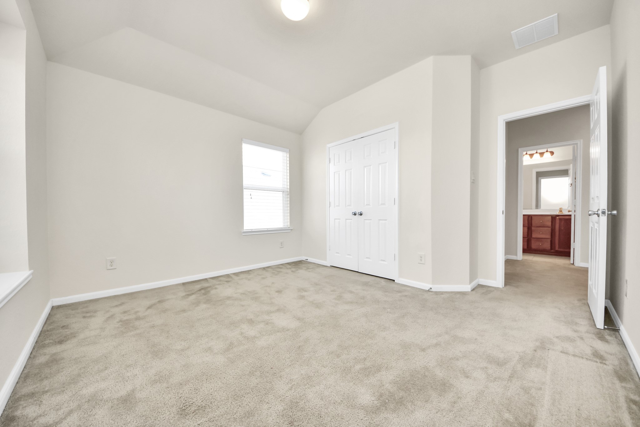 24123 Adobe Ridge Lane Katy, TX 77493 - Photo 30 of 45 an empty room with windows and entrance