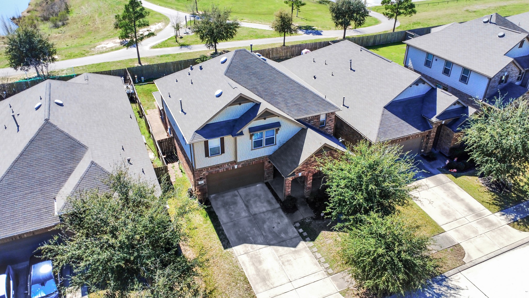 24123 Adobe Ridge Lane Katy, TX 77493 - Photo 4 of 45 an aerial view of a house with a garden and plants