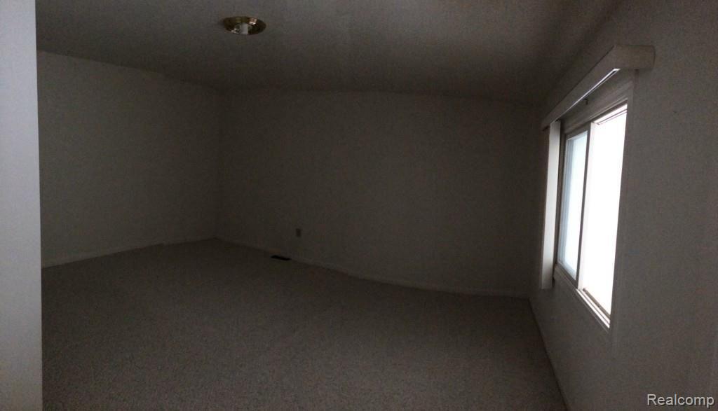 1640 Boulder Court, Unit 65 Rochester, MI 48306 - Photo 16 of 31 Finished 2nd Bonus Bedroom with Balcony Overlook.jpg