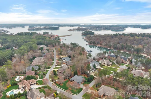 an aerial view of multiple house with outdoor space