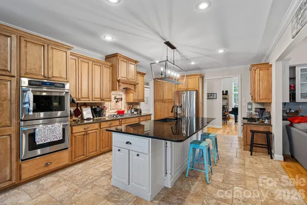 a large kitchen with cabinets