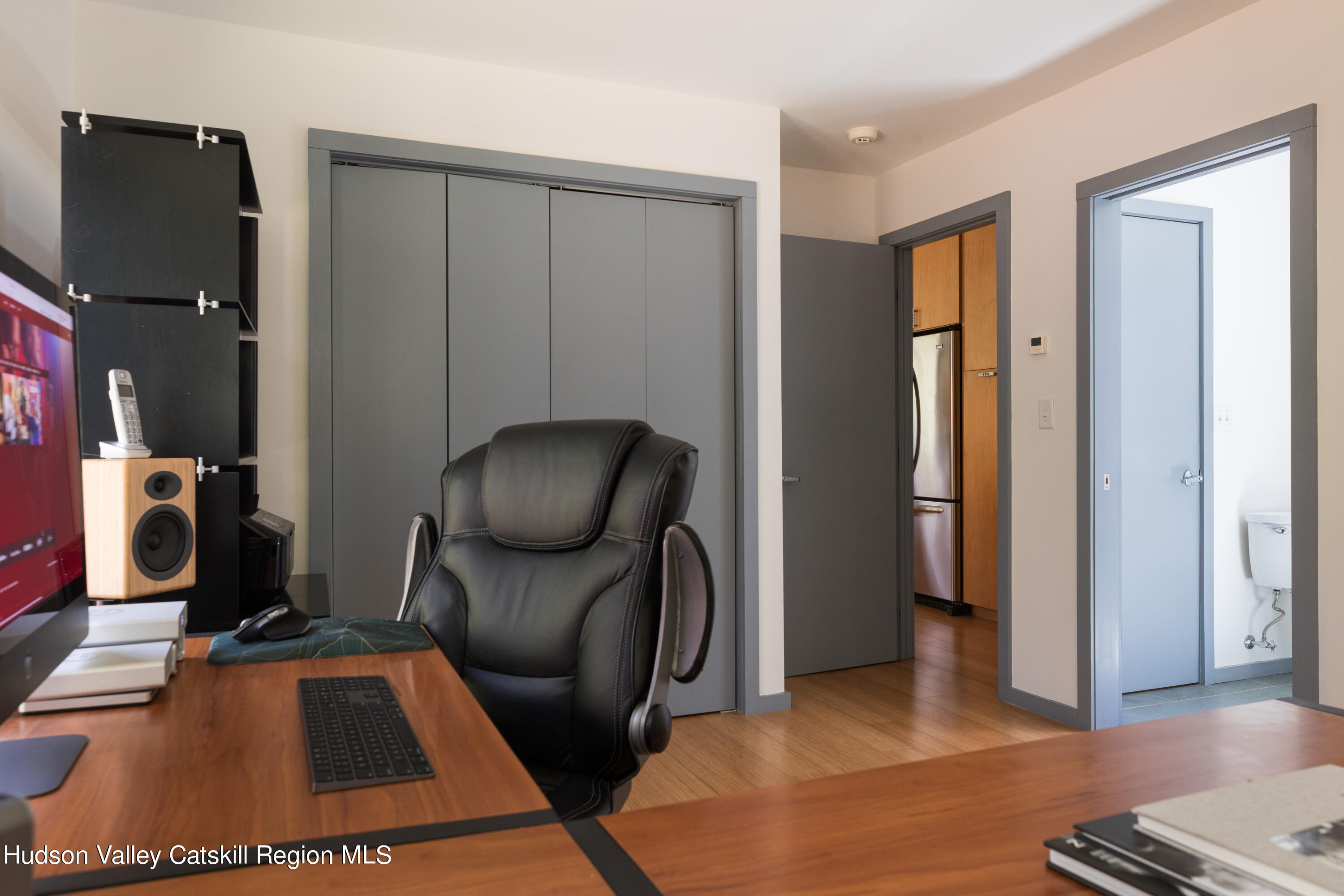 177 Stillwater Road Stone Ridge, NY 12484 - Photo 15 of 27 a room with furniture and a wooden floor