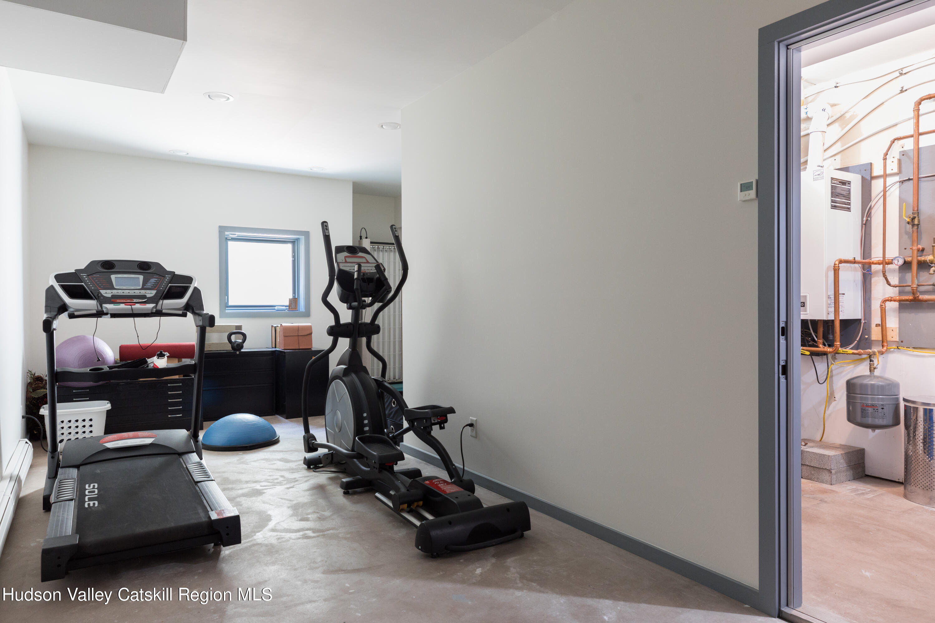 177 Stillwater Road Stone Ridge, NY 12484 - Photo 19 of 27 a room with gym equipment