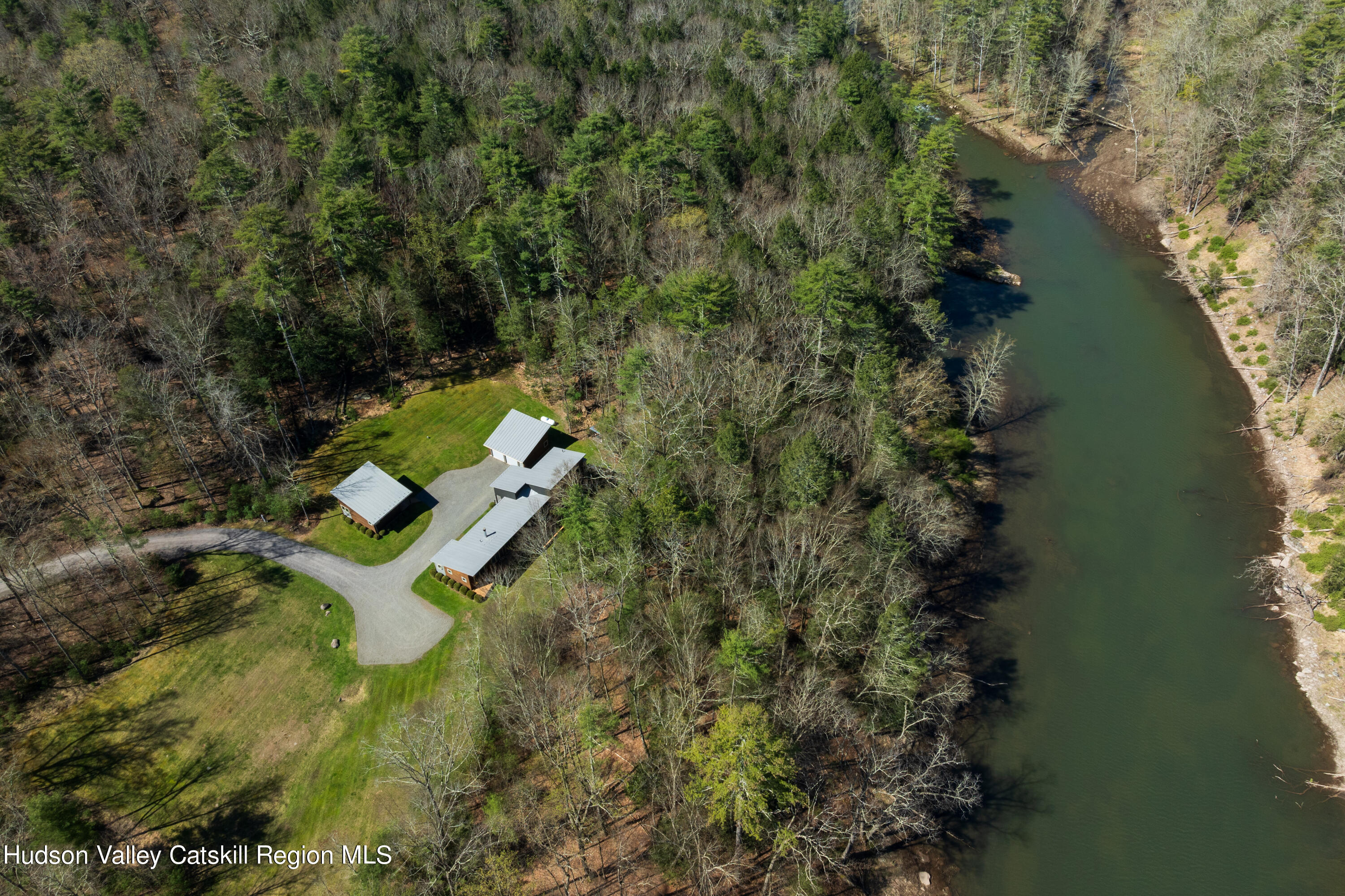 177 Stillwater Road Stone Ridge, NY 12484 - Photo 23 of 27 an aerial view of a house with outdoor space and trees all around