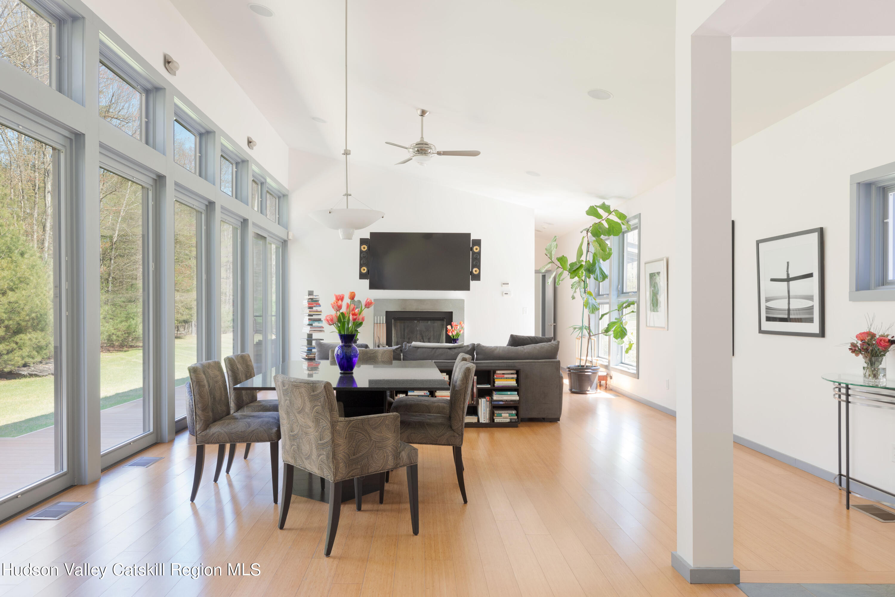 177 Stillwater Road Stone Ridge, NY 12484 - Photo 5 of 27 a view of a dining room with furniture window and wooden floor