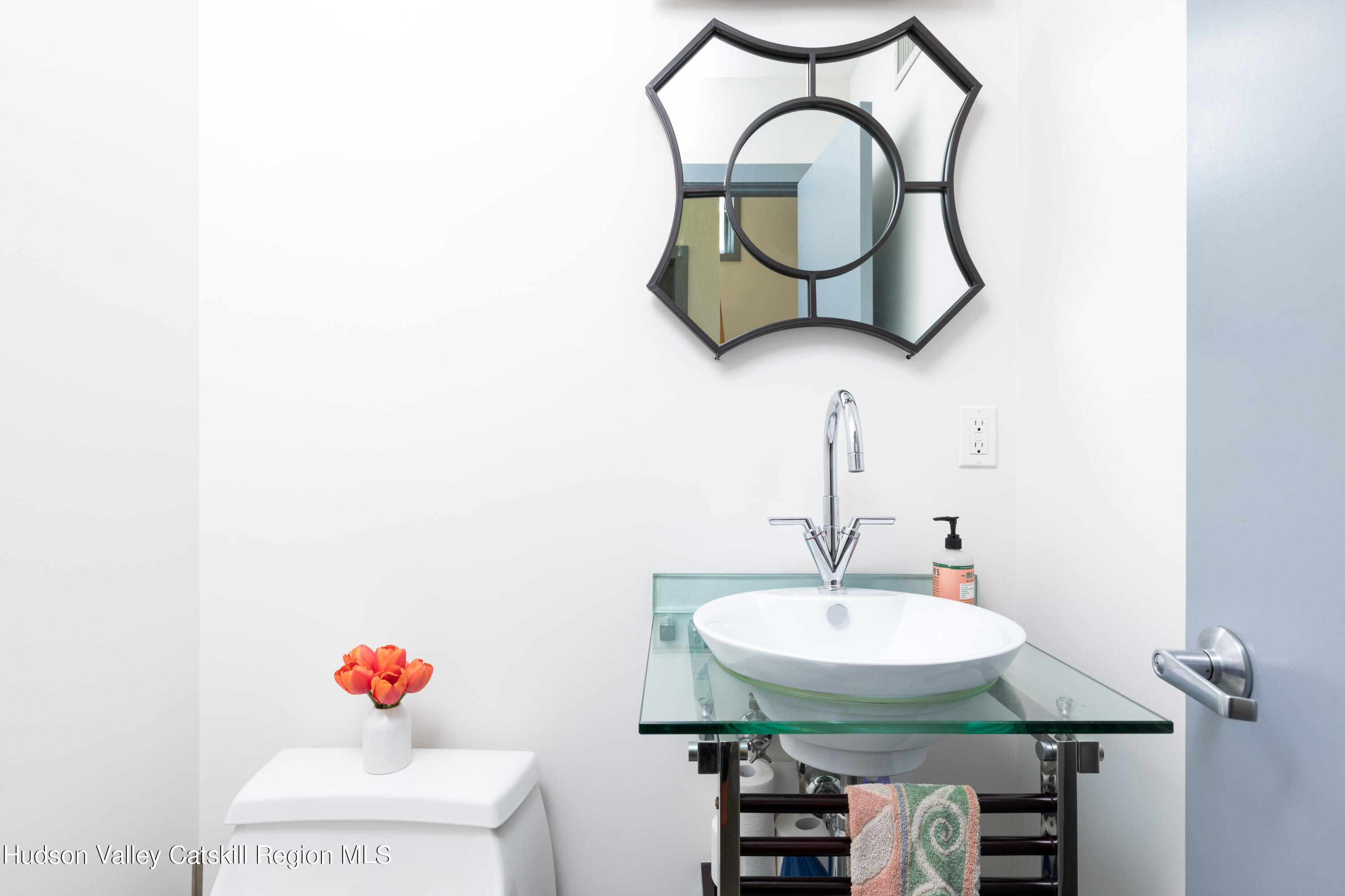 177 Stillwater Road Stone Ridge, NY 12484 - Photo 9 of 27 a bathroom with a sink and a mirror