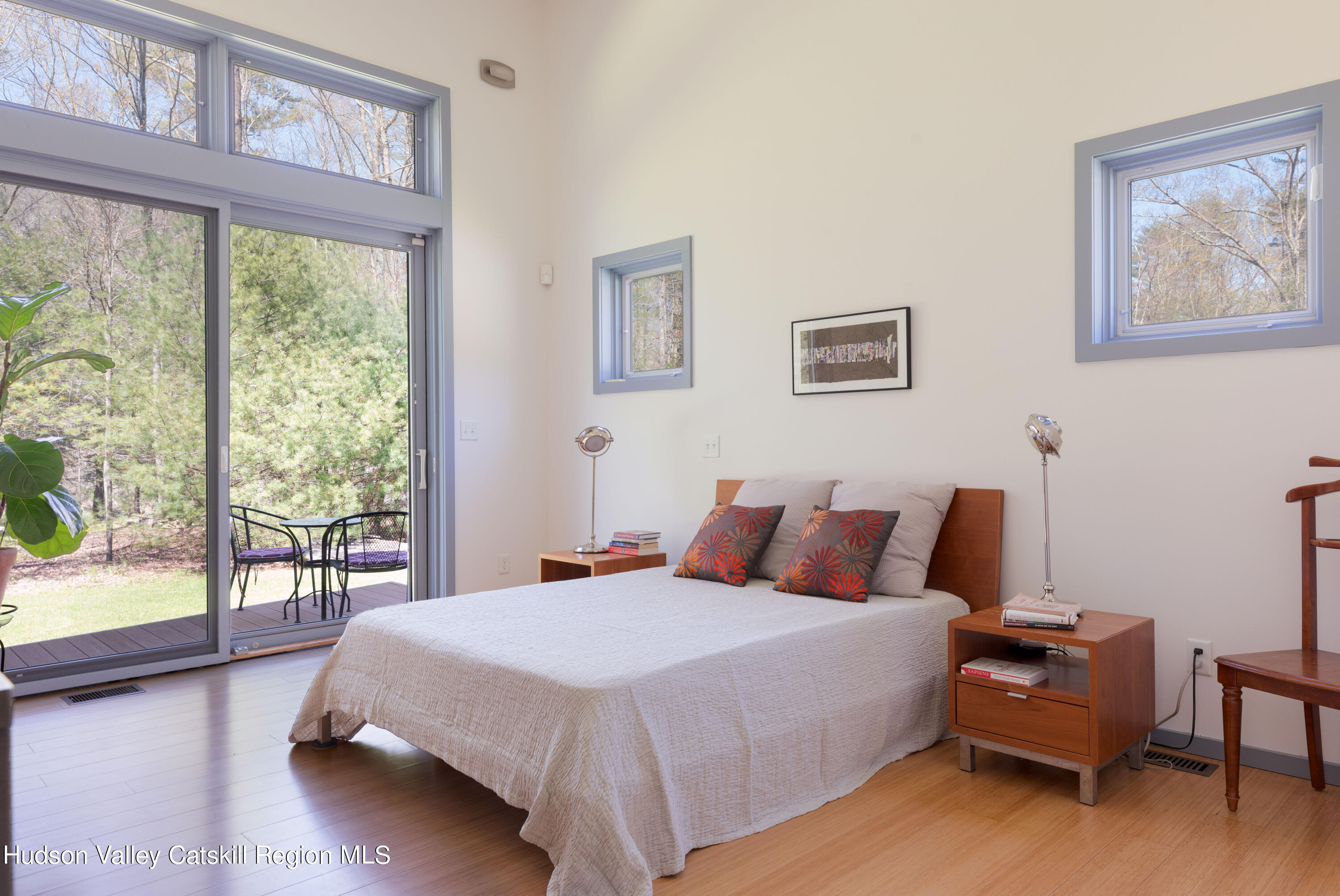 177 Stillwater Road Stone Ridge, NY 12484 - Photo 10 of 27 a bedroom with a bed and a large window