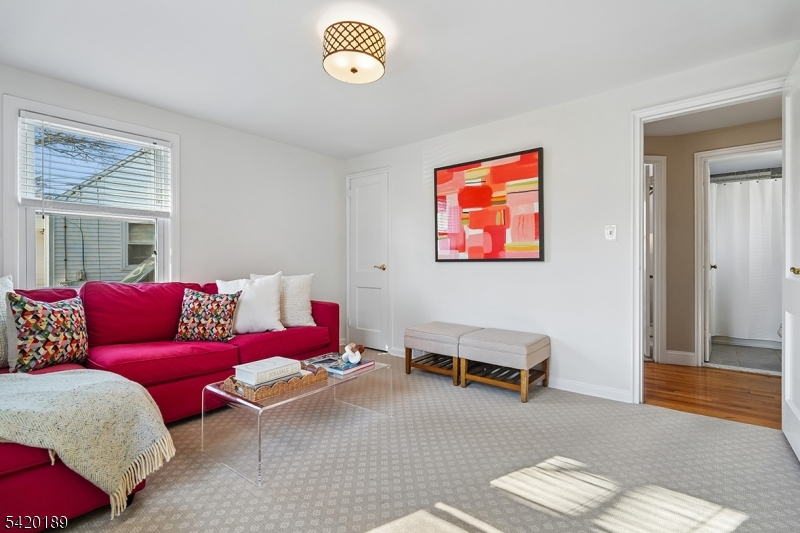 8 Edison Drive Summit, NJ 07901 - Photo 12 of 34 a living room with furniture and a window
