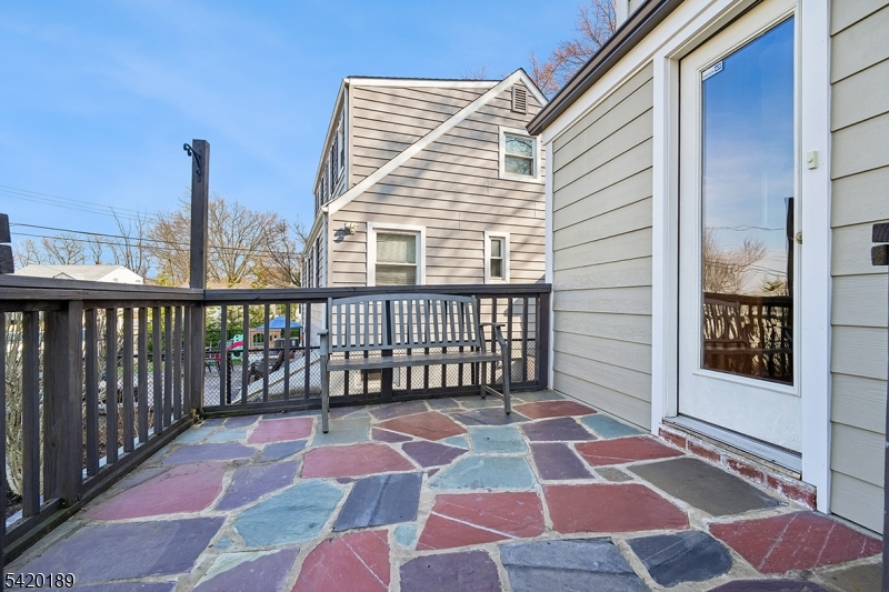 8 Edison Drive Summit, NJ 07901 - Photo 29 of 34 a view of a balcony with a stove