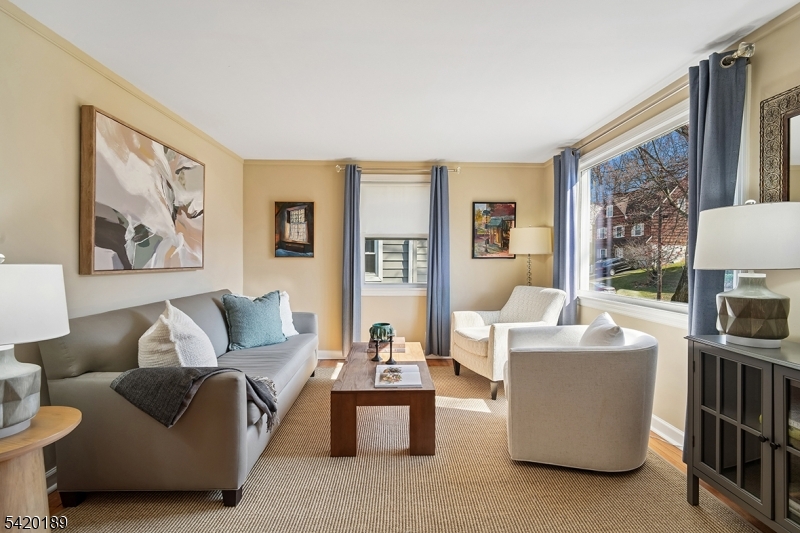 8 Edison Drive Summit, NJ 07901 - Photo 4 of 34 a living room with furniture and a window