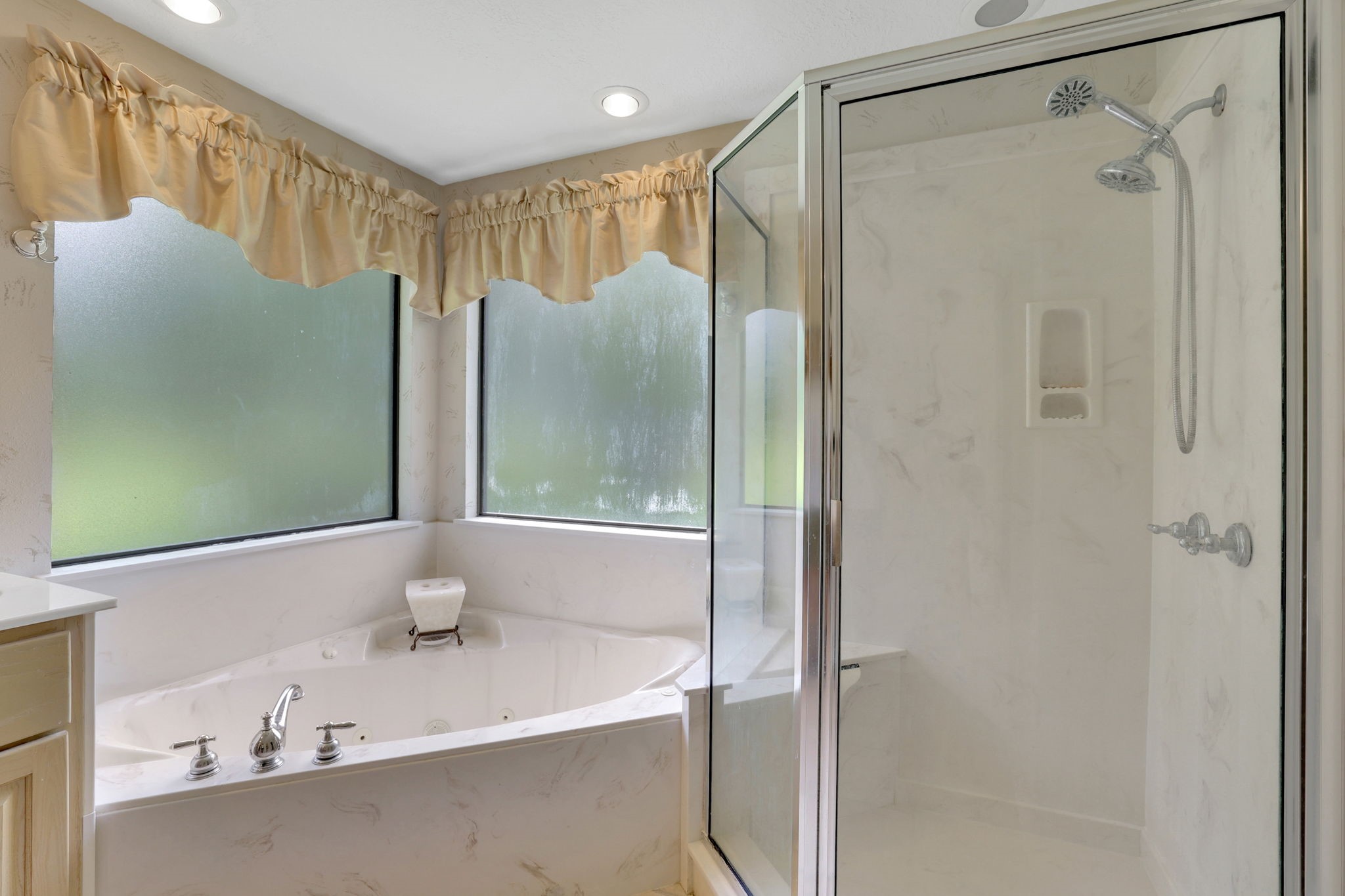 780 Hickory Ridge Drive Coldspring, TX 77331 - Photo 23 of 40 The primary bathroom has a soaking tub and separate shower
