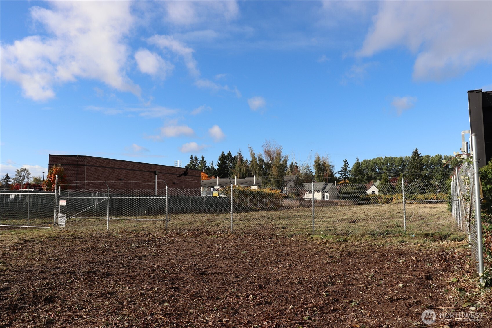 23809 West Valley Highway Kent, WA 98032 - Photo 3 of 23 a backyard of a house with lots of green space