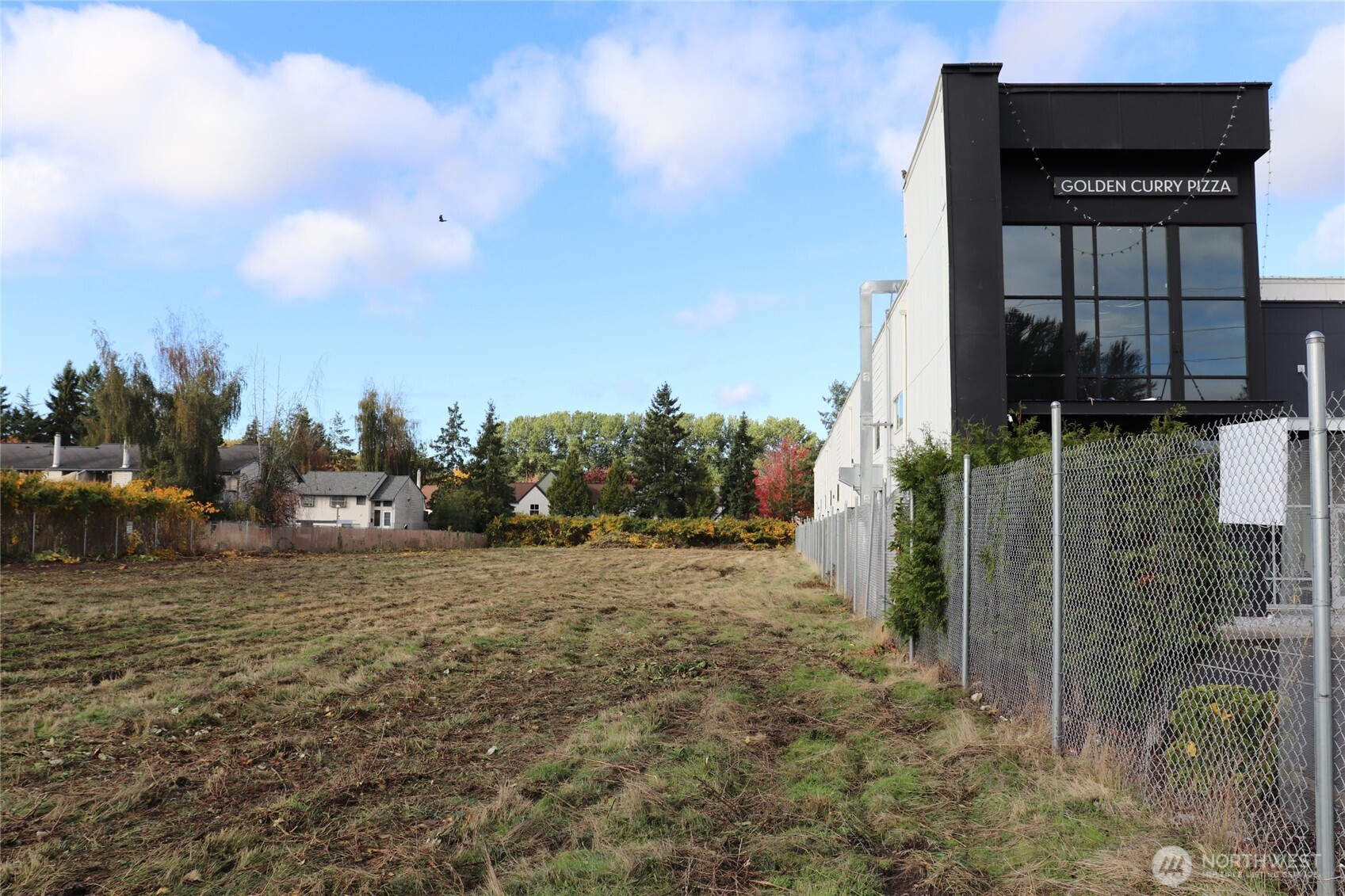 23809 West Valley Highway Kent, WA 98032 - Photo 10 of 23 a row of car parked in front of house