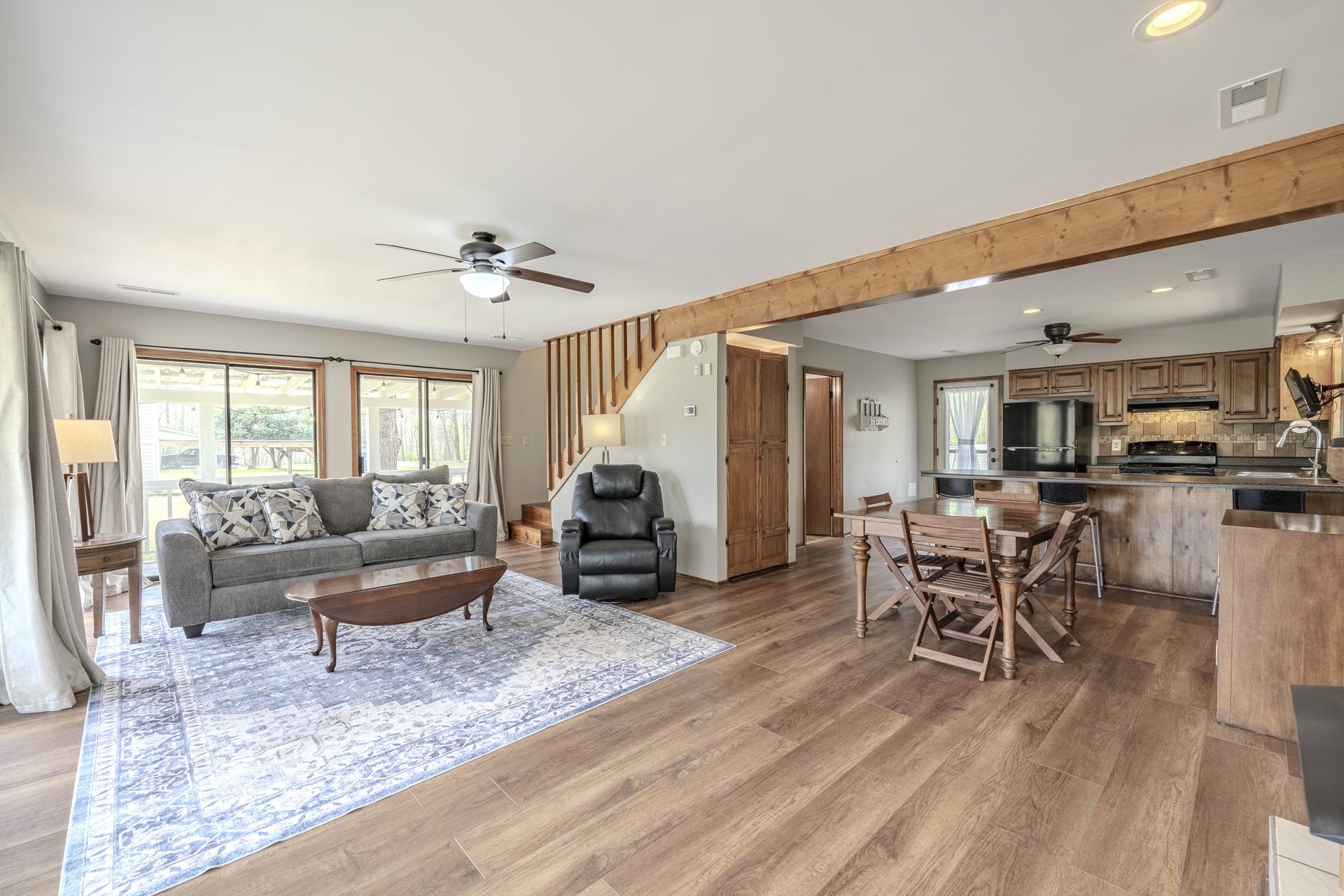 1085 Old Road Counce, TN 38326 - Photo 12 of 30 a living room with furniture a table and wooden floor