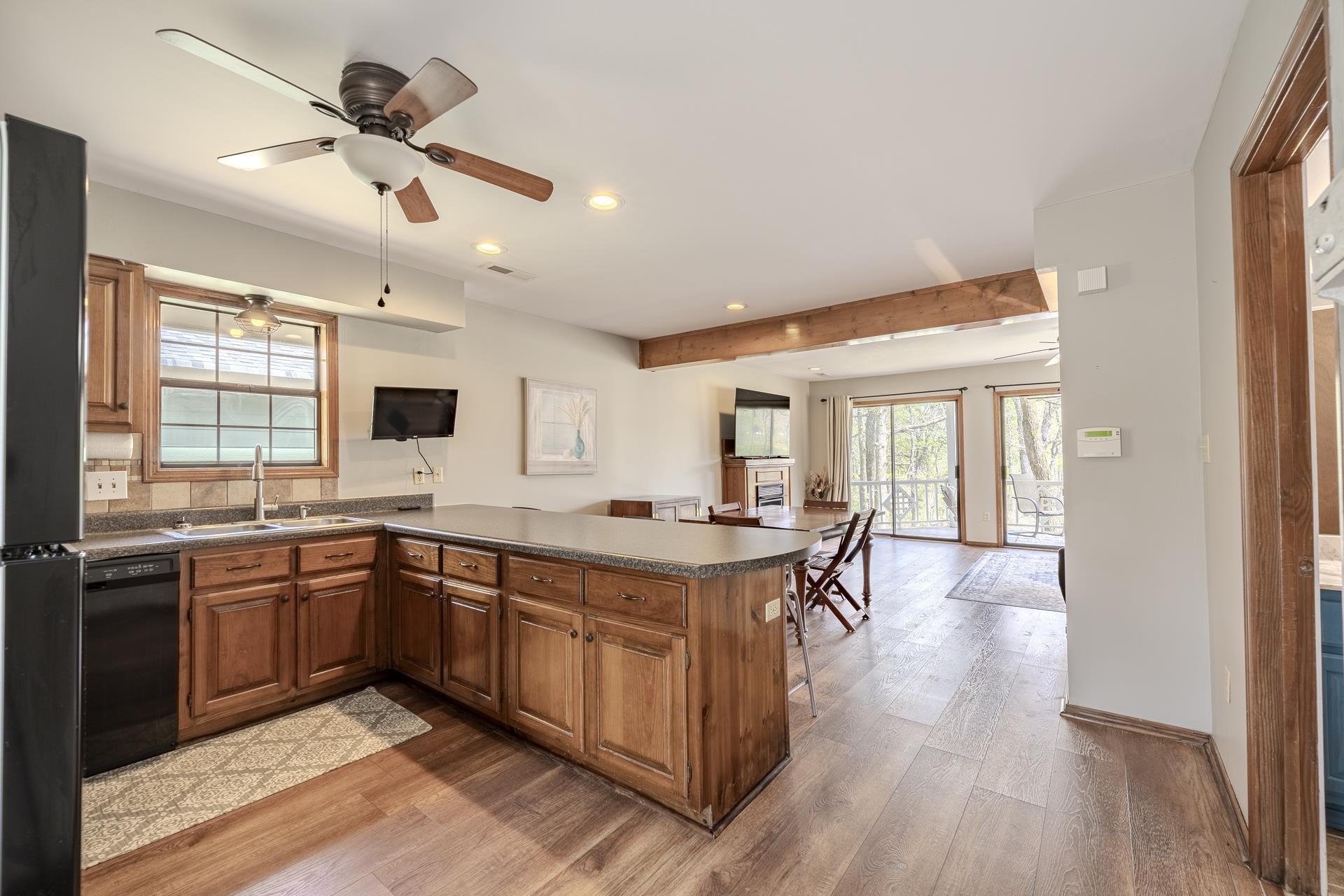 1085 Old Road Counce, TN 38326 - Photo 18 of 30 a kitchen with stainless steel appliances granite countertop a stove and a sink