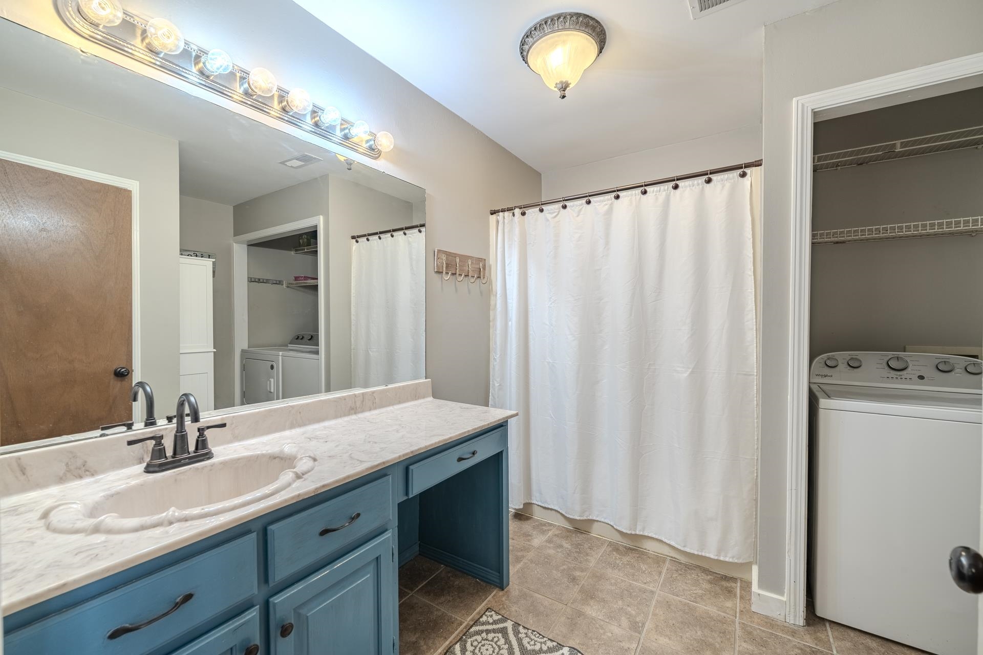 1085 Old Road Counce, TN 38326 - Photo 24 of 30 a bathroom with a double vanity sink and a mirror