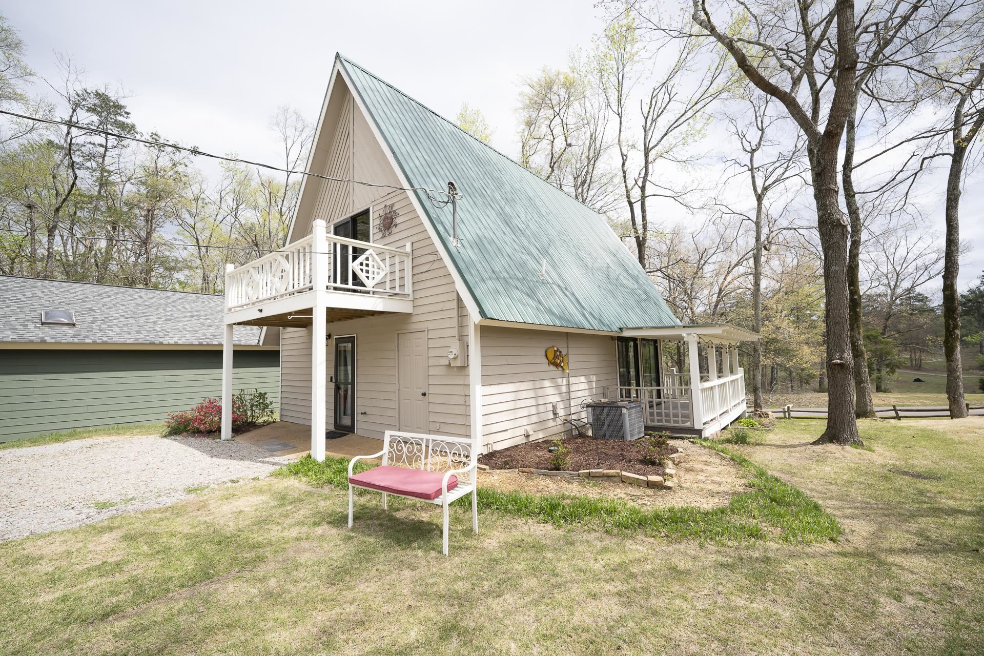 1085 Old Road Counce, TN 38326 - Photo 3 of 30 a backyard of a house with yard and outdoor seating