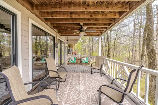 a view of a porch with furniture