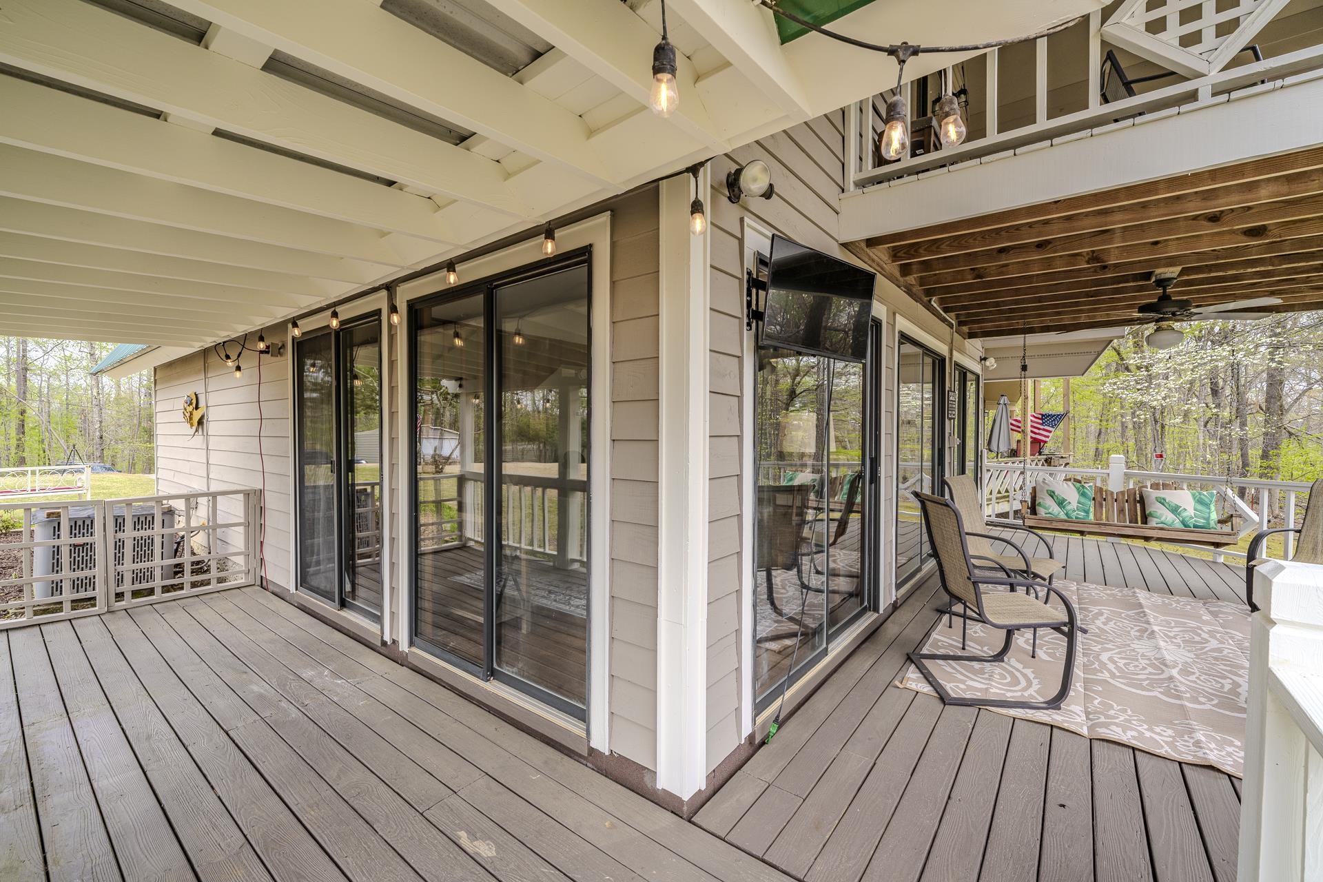 1085 Old Road Counce, TN 38326 - Photo 7 of 30 a view of a porch with wooden floor front door