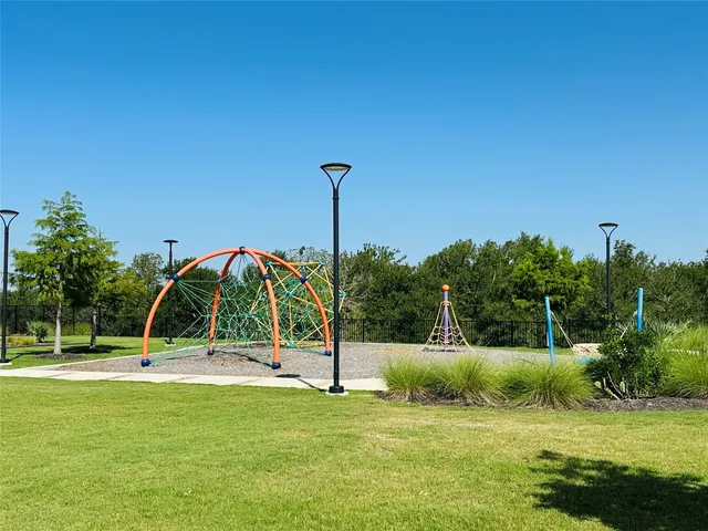 a view of a garden with a slide